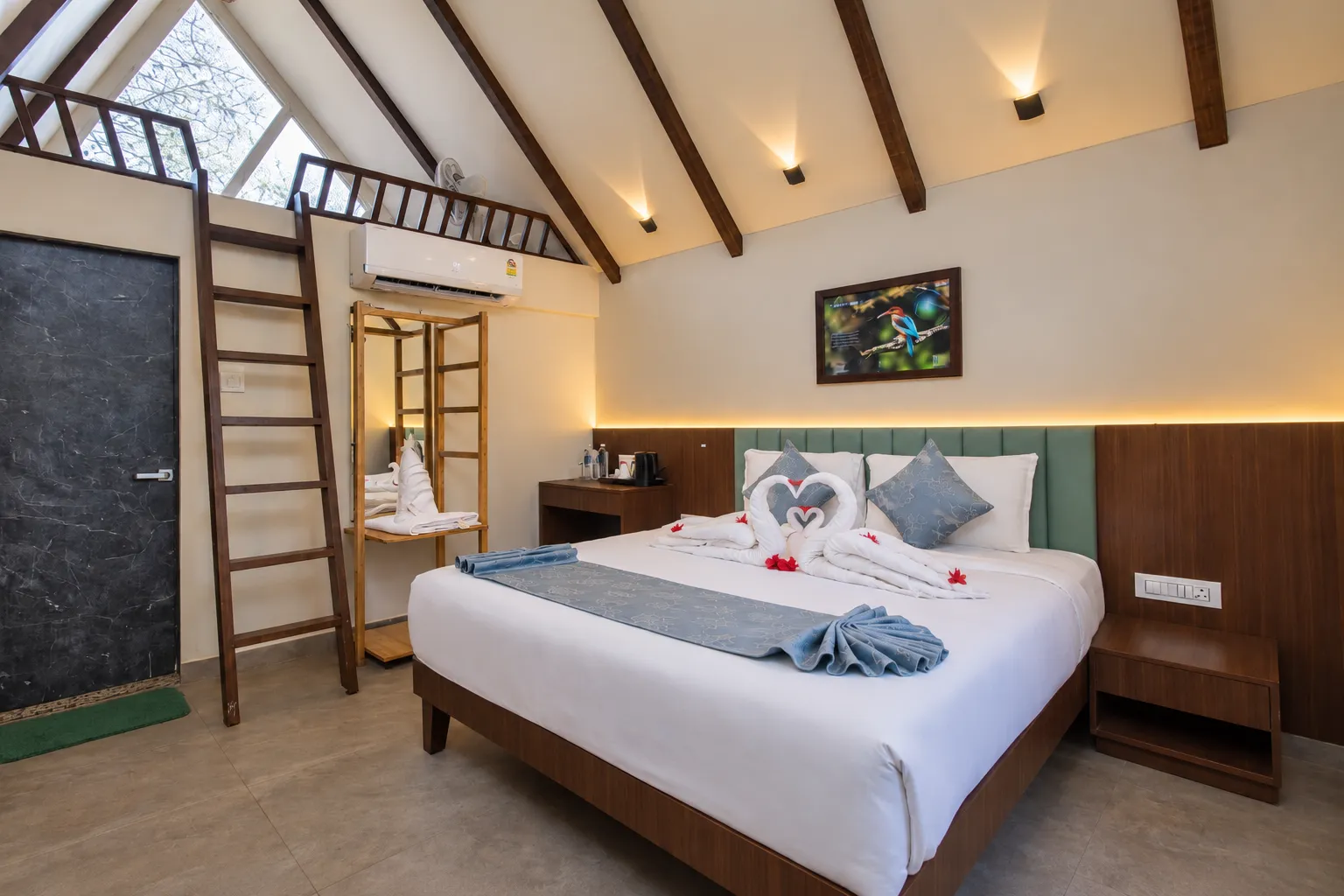 Cozy Loft Bedroom with Swan Towel Art