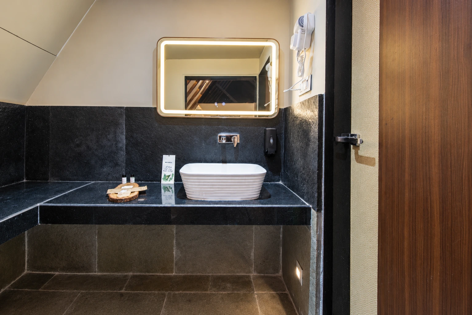 Warm Hotel Vanity with Illuminated Mirror